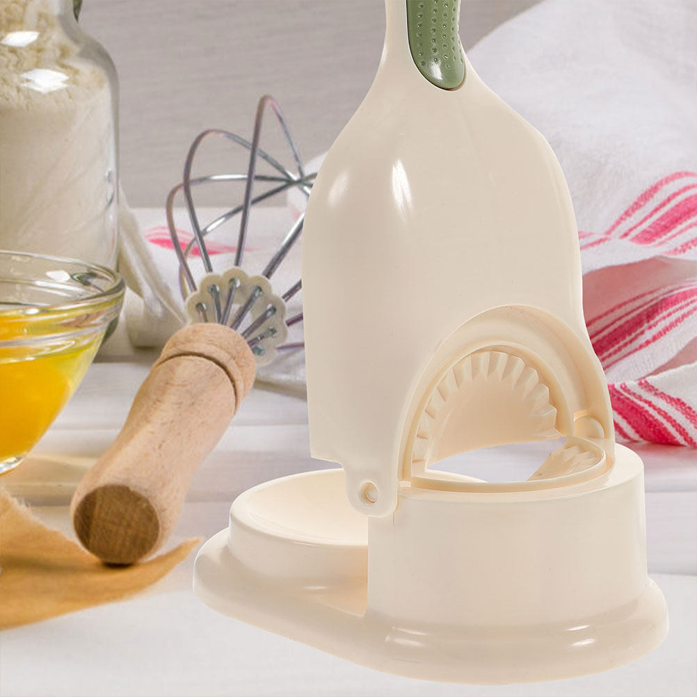 قطعتان من أداة ضغط عجينة الزلا - مراجعة Kitchen Gadgets Dumpling Maker وسعره